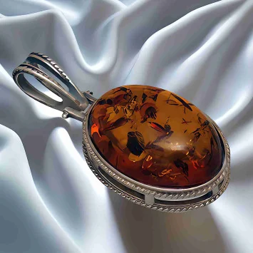 TODEX JEWELLERY|zawieszka srebrna z bursztynem – klasyczna owalna forma
